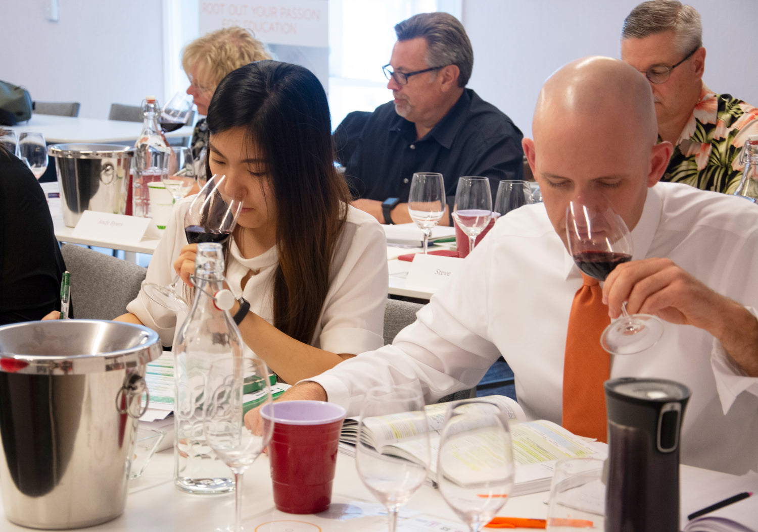 WSET students nosing red wine in a Napa Valley Wine Academy tasting class