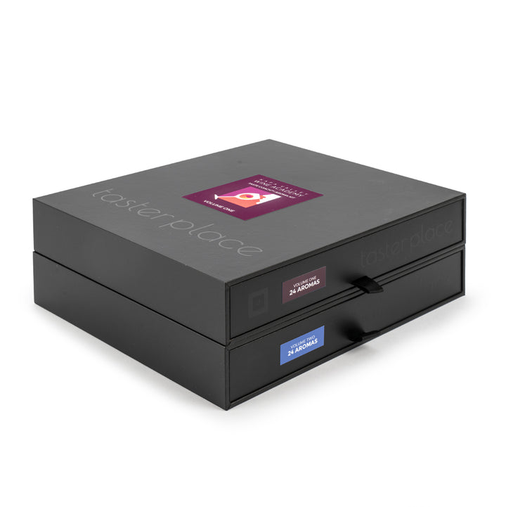 Taste Coach 48 Aroma Kit featuring a black box with a lid, includes a purple card displaying a wine glass, designed for enhancing wine-tasting skills.