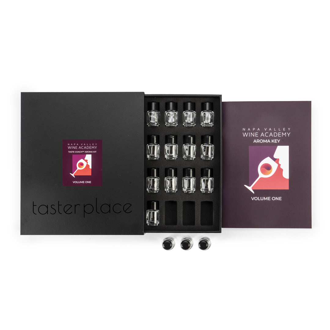 Taste Coach 48 Aroma Kit with small bottles in a labeled box, designed to enhance wine-tasting skills through distinct white and red wine aromas.