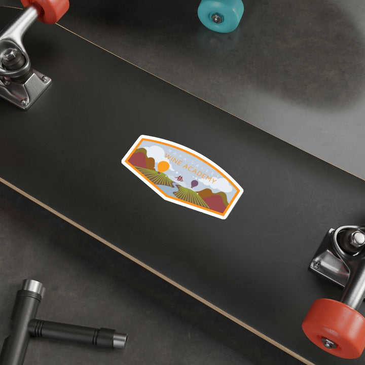 Napa Valley Wine Academy Landscape Stickers on a skateboard with red wheels, featuring vineyard scenery and the Golden Gate Bridge, capturing Napa's essence.