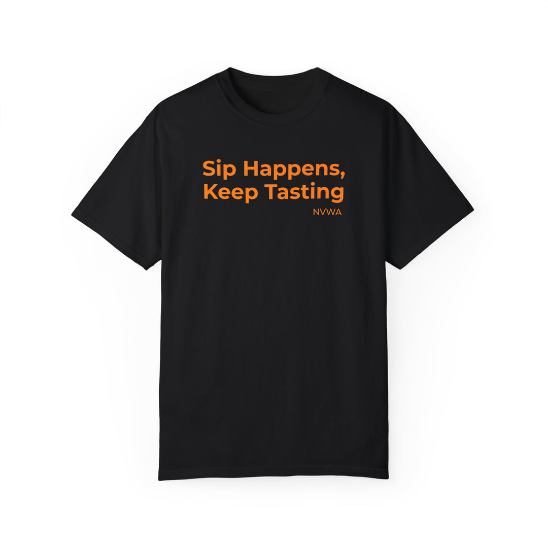 NVWA T-shirt “Sip Happens, Keep Tasting” featuring orange text on a black shirt, ideal for wine enthusiasts, with a relaxed fit and durable stitching.