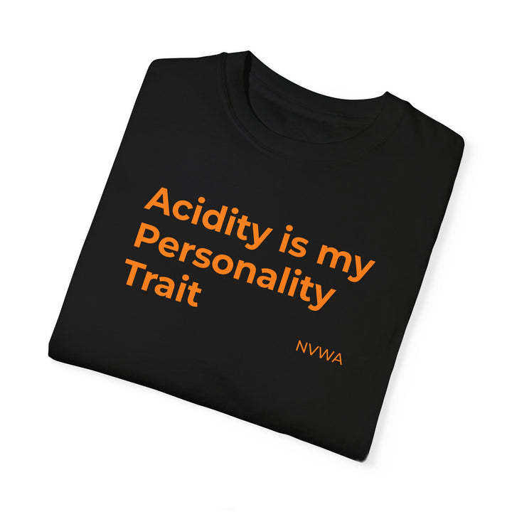 NVWA T-shirt with “Acidity is my Personality Trait” slogan in orange text on black, ideal for wine enthusiasts, featuring relaxed fit and durable stitching.