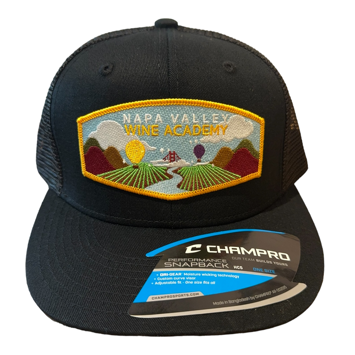 NVWA Baseball Cap with NVWA Patch, featuring an embroidered river and bridge design. High-quality black hat, perfect for wine enthusiasts and professionals.