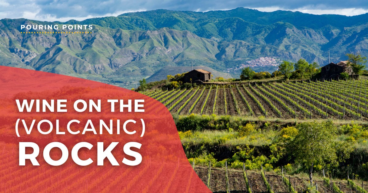 wine on the volcanic rocks words over vineyards
